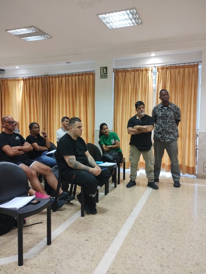 Charla el dia de la Mujer, en Seguridad